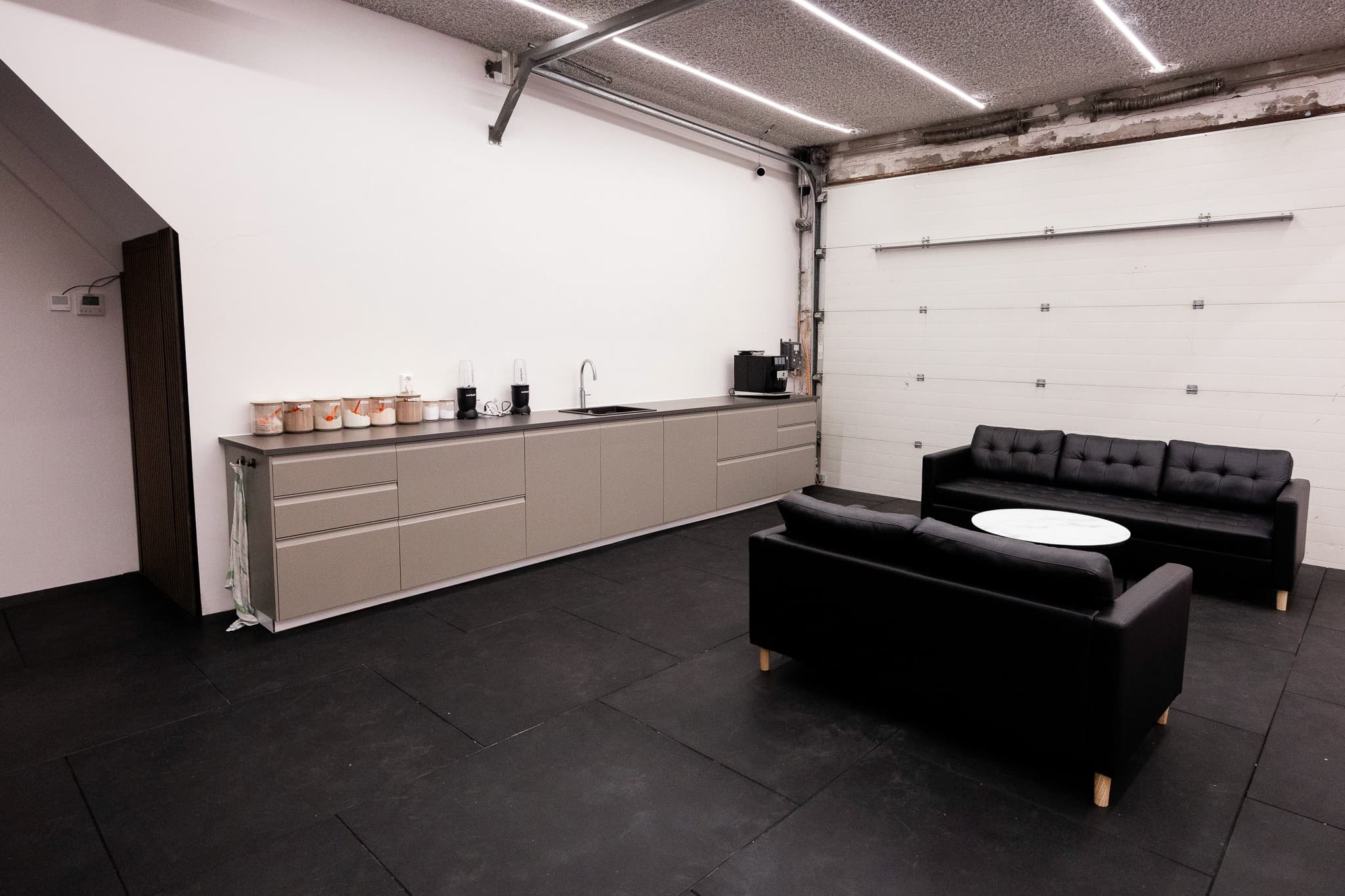 Iconic Studio shake bar and lounge area — complimentary protein shakes, private seating